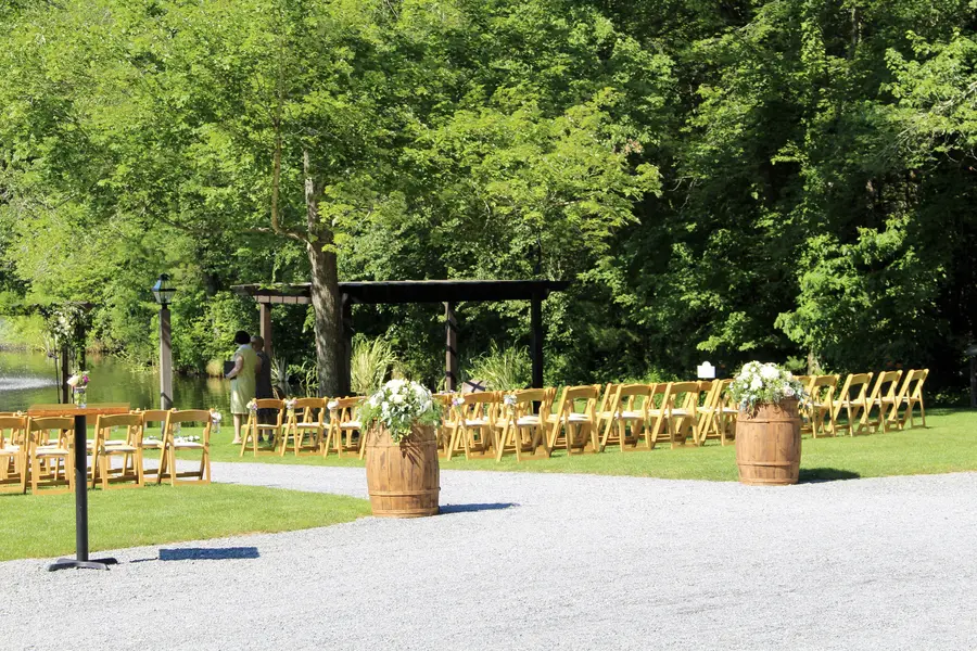 Ceremony seating beneath the trees