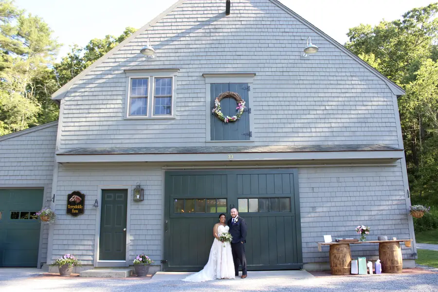Couple in front of the barn