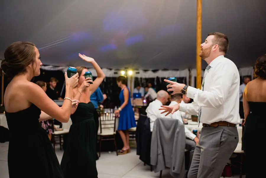 Guests celebrating inside the tent